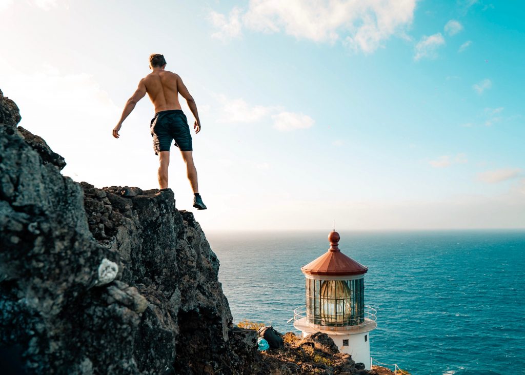 A man standing on a cliff