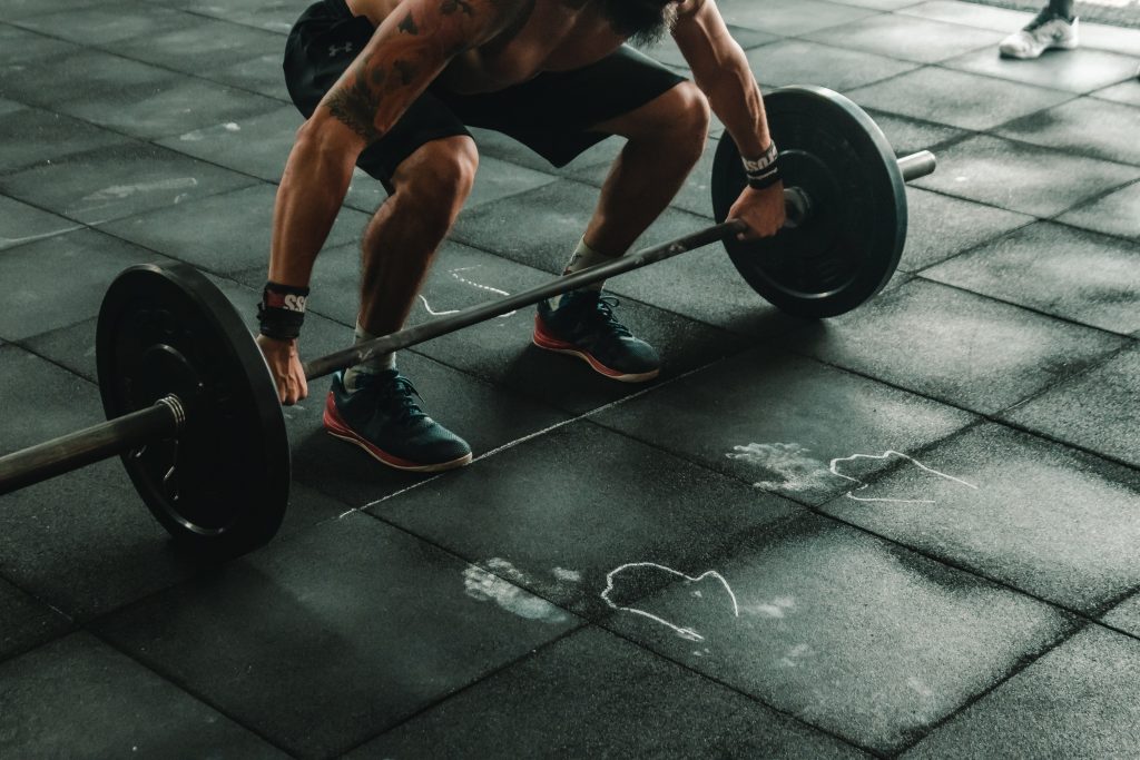 man-about-to-lift-barbell-2261477